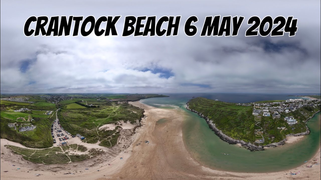 Longboard and paddle board surfing waves at Crantock Beach Cornwall. DJI mini pro 4.