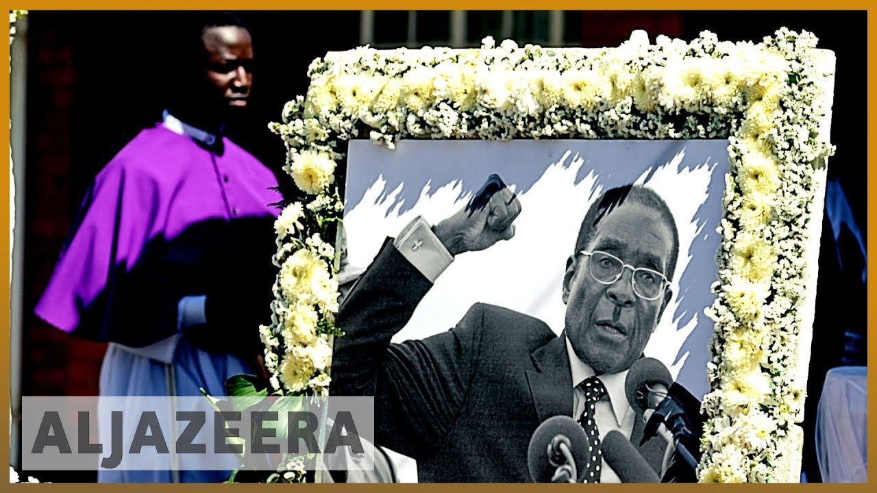 Zimbabwe ex-president Robert Mugabe buried in his native village