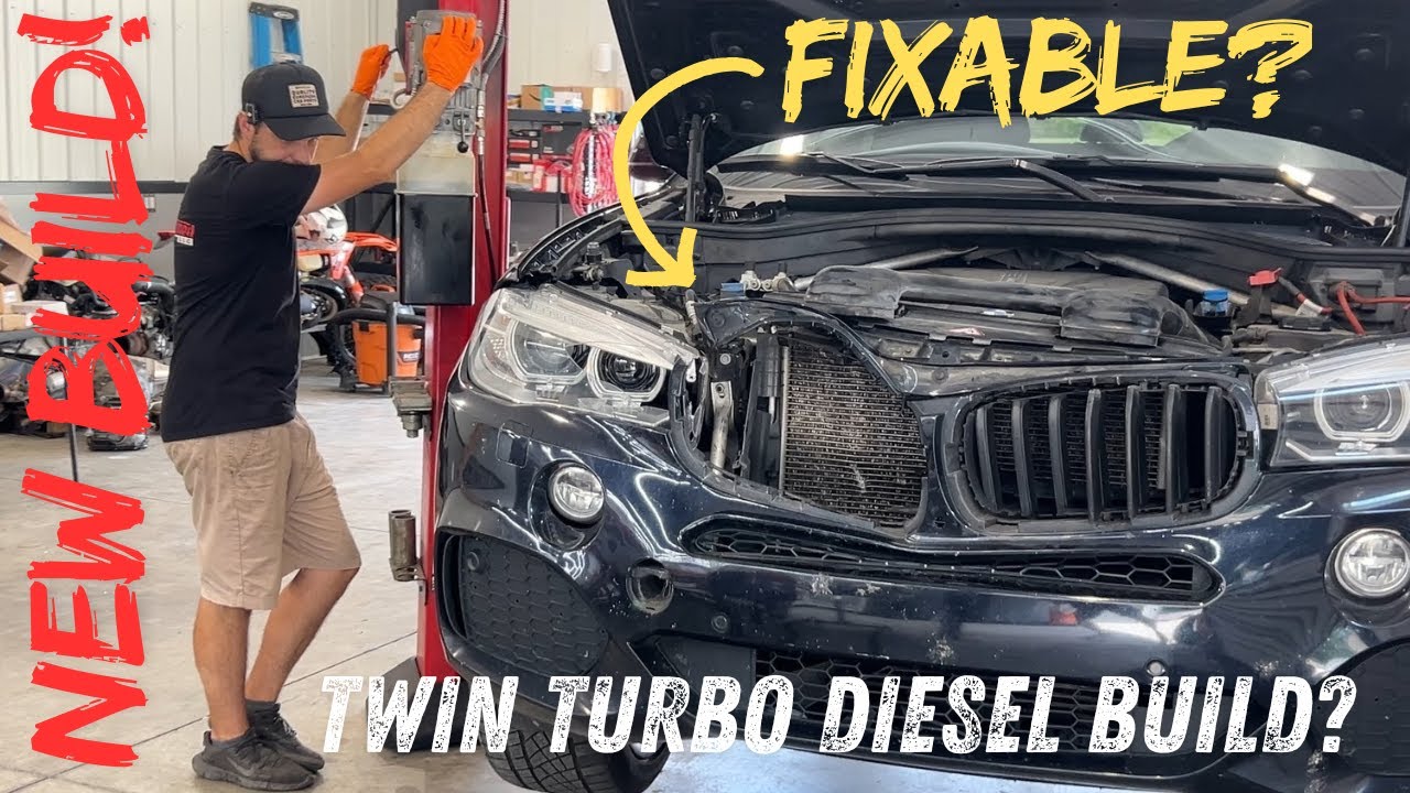 REBUILDING a Smashed BMW X5 (PART 1)