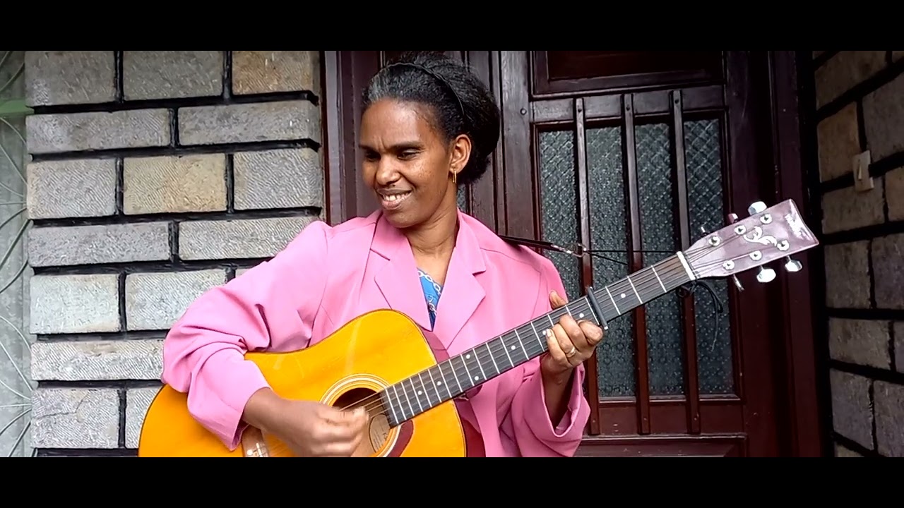 በእግዚአብሔር አትዘን ወገኔ  በወለጋ ወርቅ ኃይሌ (ኩቼ)