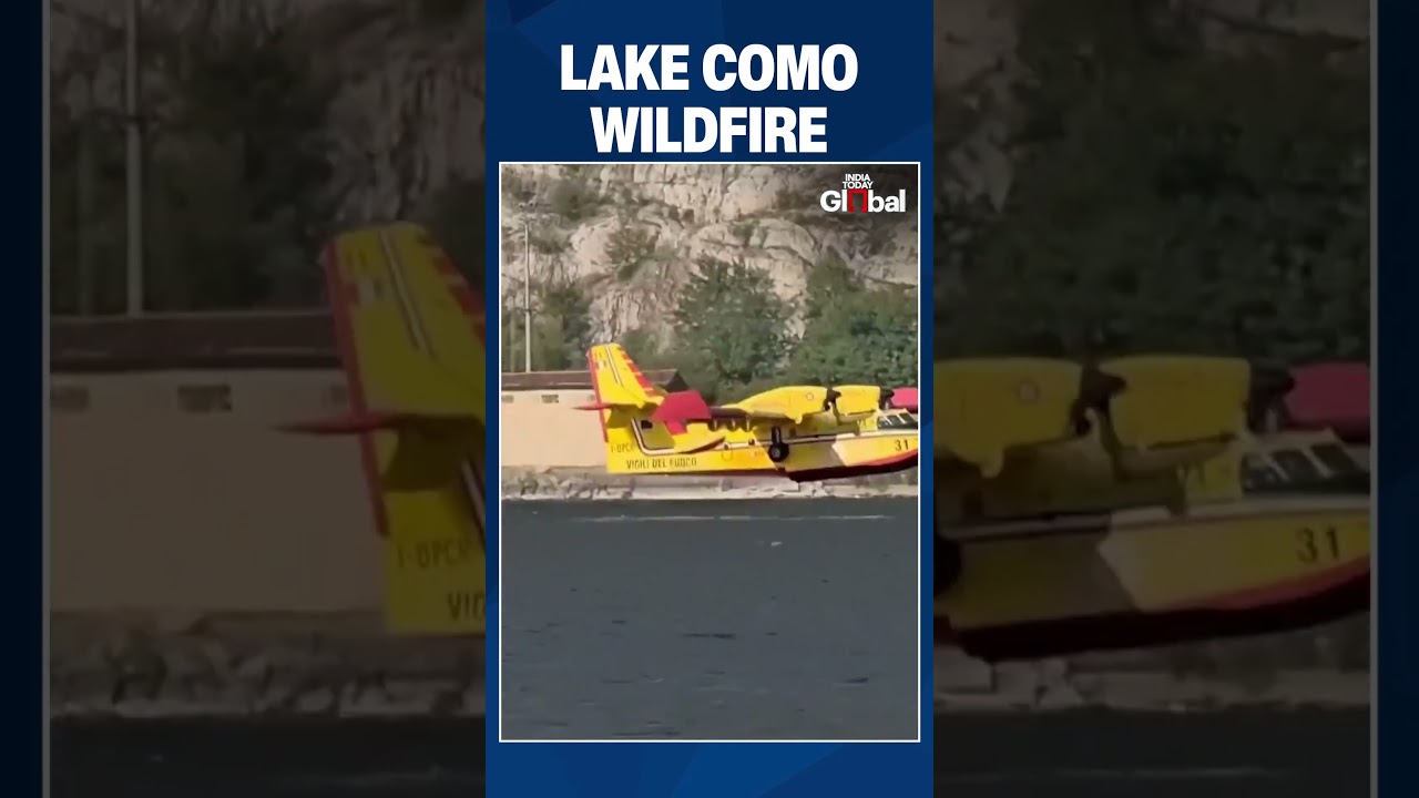 Lake Como Wildfire Intensifies As Firefighting Aircraft Scoop Water To Battle Flames In Italy