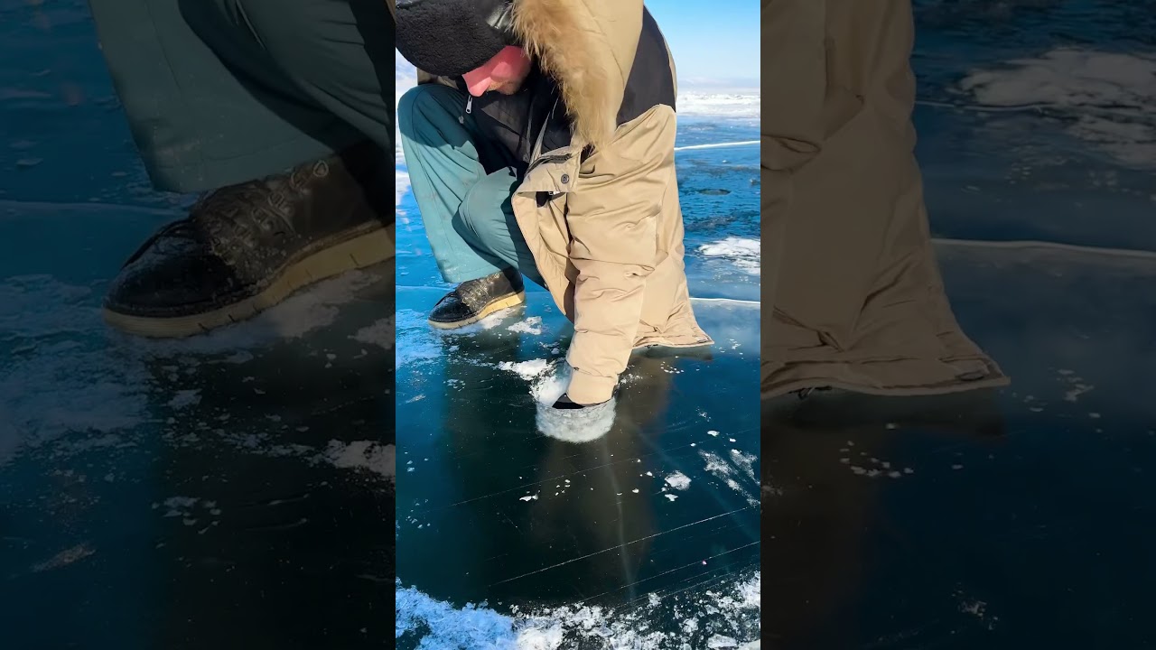 🤯 Wait for the water crack!!! #siberia #lakebaikal #russia #frozenlake #ice