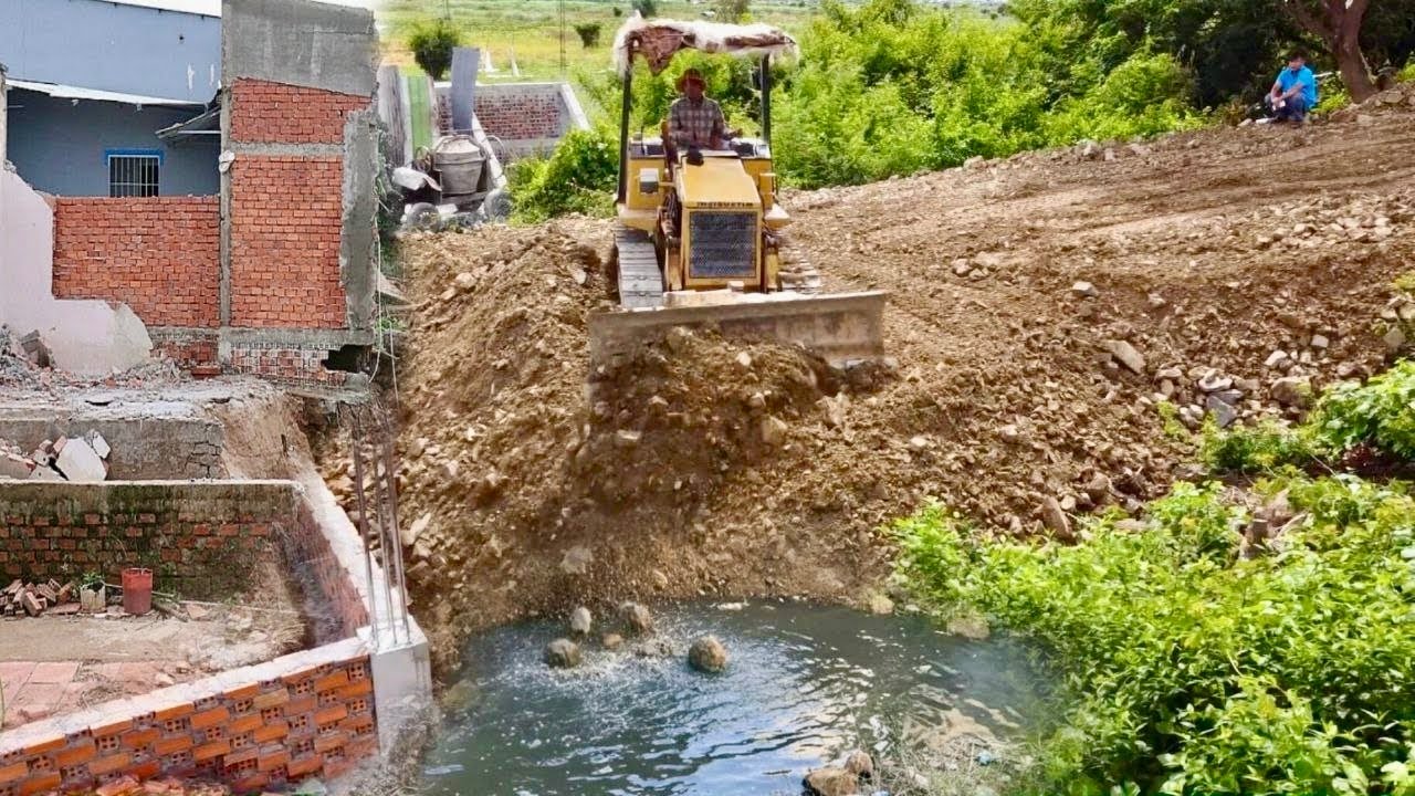 Start Opening New Project!!Mitsubishi Bulldozer BD2A pushing Soil into Flooded forest &5Ton Trucks​.