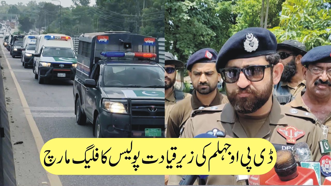 Police's flag march led by DPO Jhelum Capt (r) Aamir Khan Niyazi