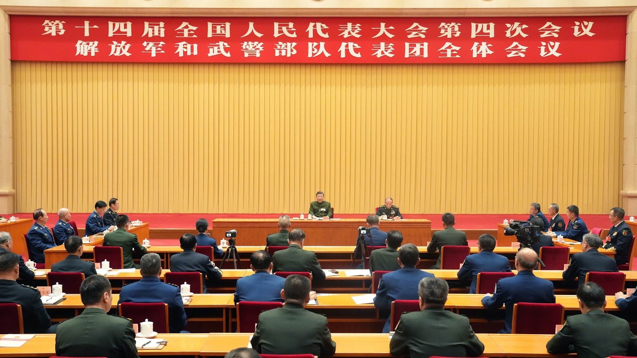 Xi Jinping attends meeting of military delegation at annual legislative session