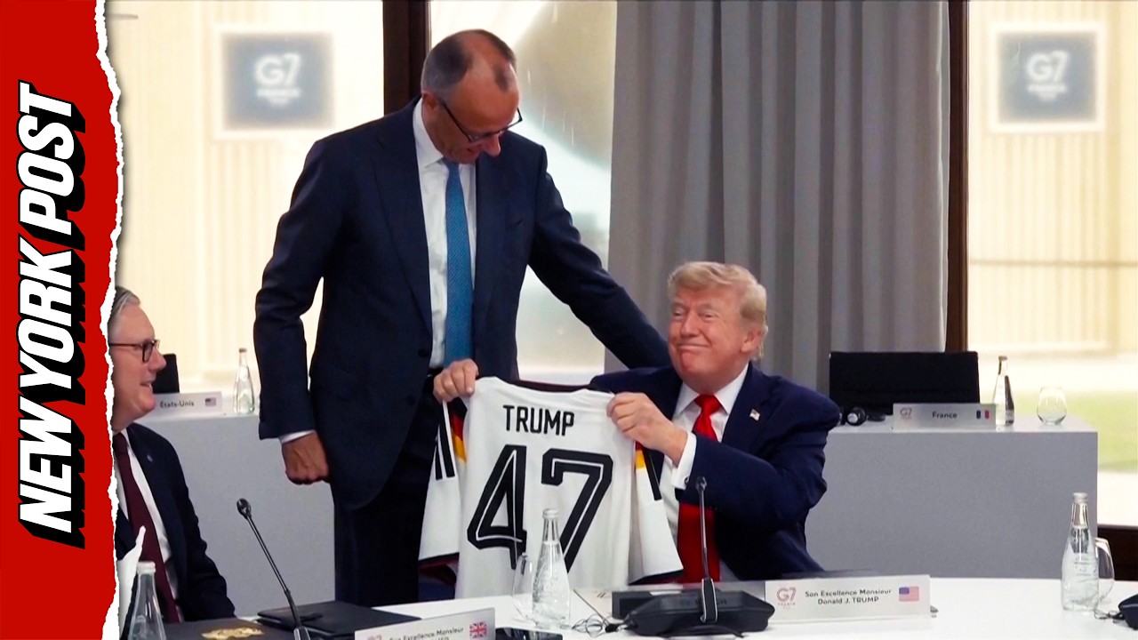 Watch Trump&rsquo;s Reaction as German Chancellor Gifts Him No. 47 Soccer Jersey at G7 Summit
