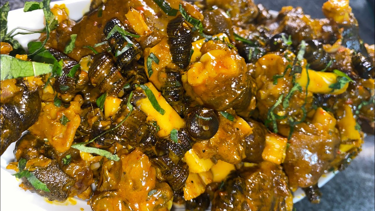 MATCHING GROUND (Garnished Goat leg and Periwinkle) #nigerianfood #nigeriandelicacy
