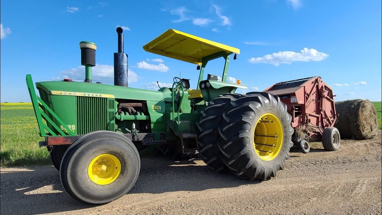Balin ditch hay with the 5020! The antique's road show of haying lol