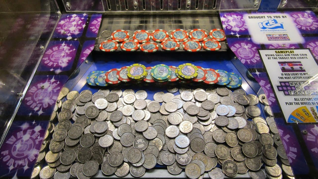WOW I PLAYED A FREE GAME ON THE COIN PUSHER AND CLEANED UP