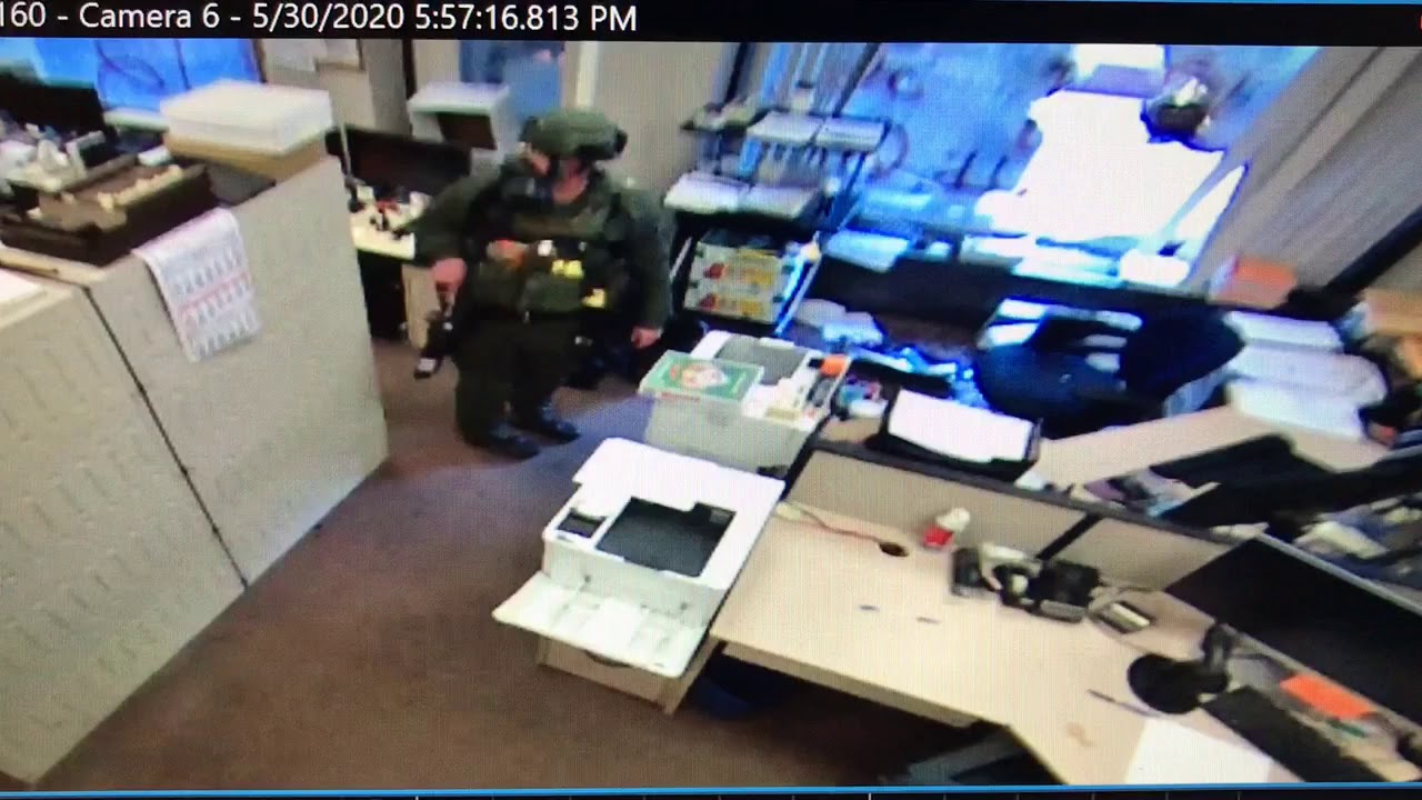 Surveillance video shows Cuyahoga County Sheriff’s deputy firing less lethal munitions out of cou...