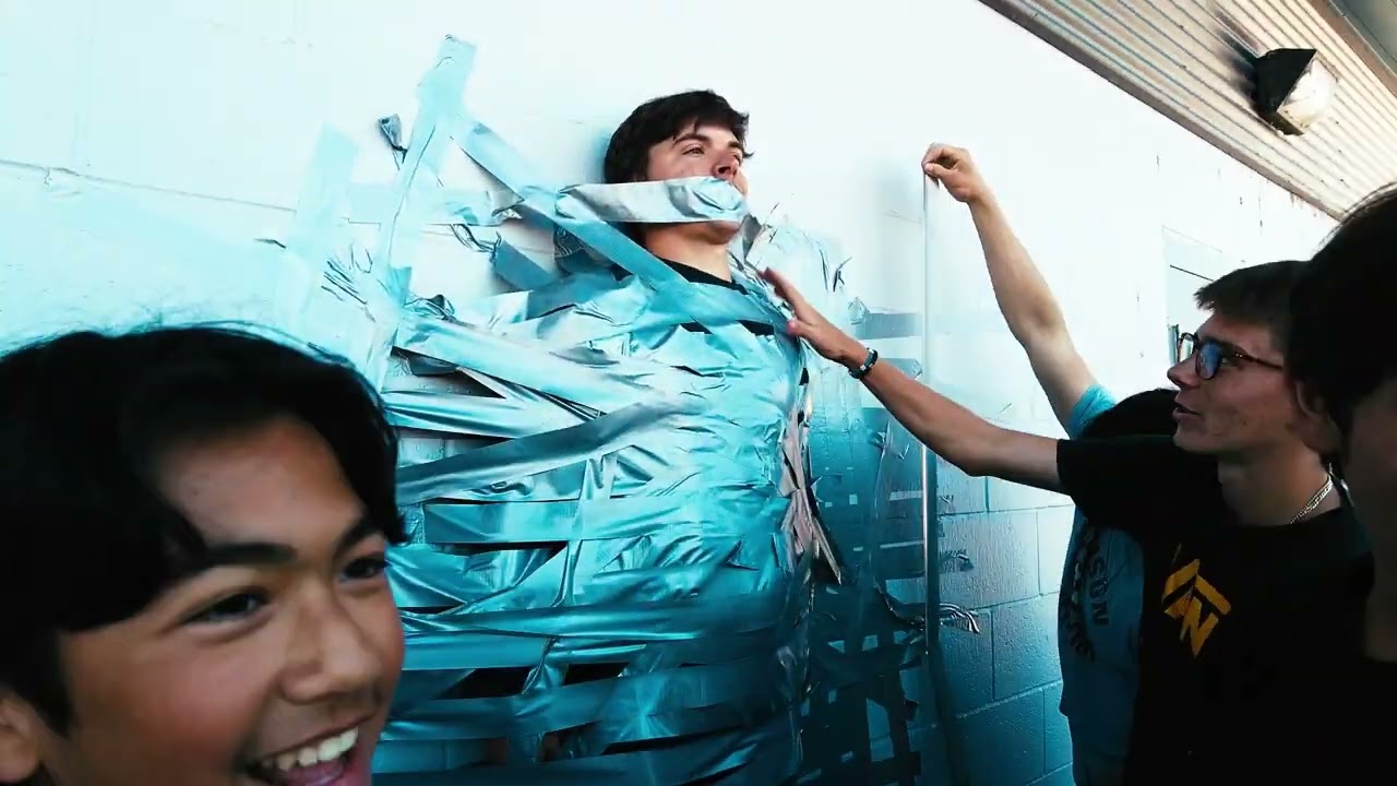 Phoenix High duct tape-a-teacher fundraiser