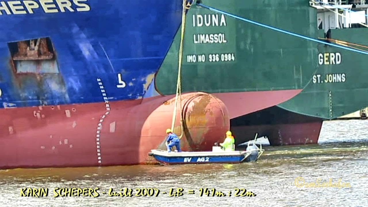 KARIN SCHEPERS V2HS3 IMO 9404077 layup being moored linesmen Emden Germany Auflieger Festmacher Sees