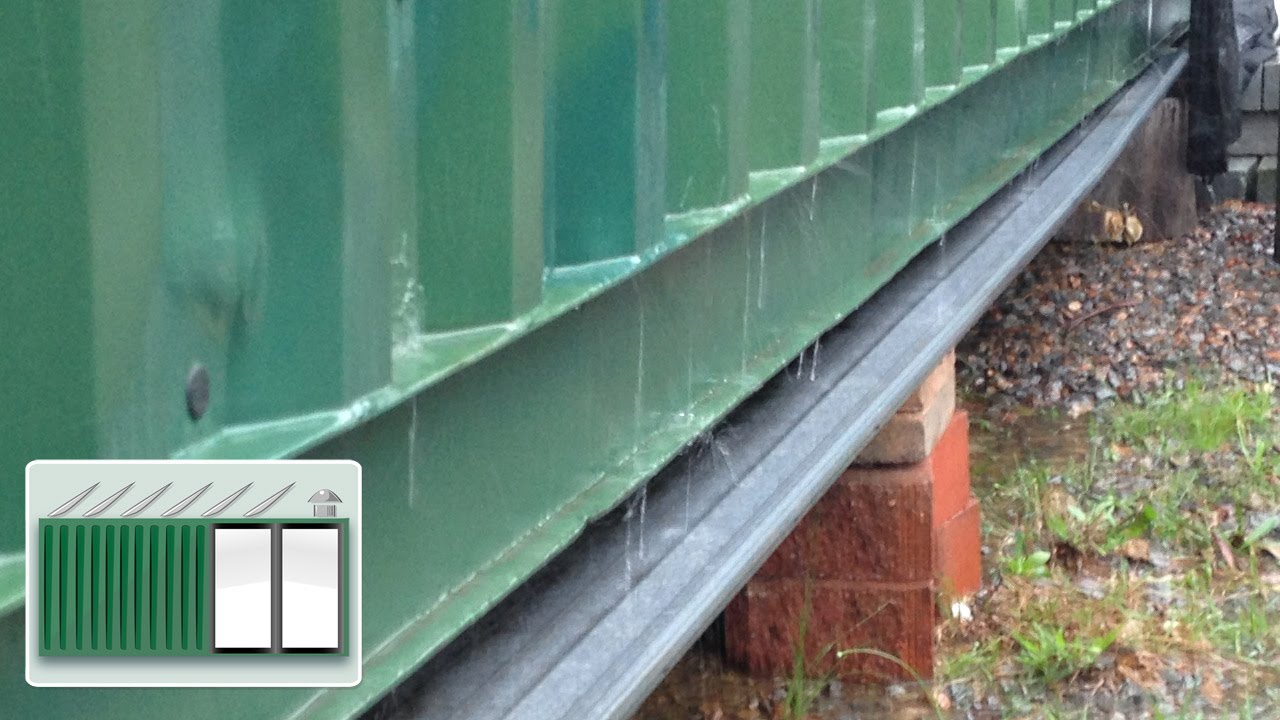 Shipping Container House - Gutters underneath shipping container to increase water catchment