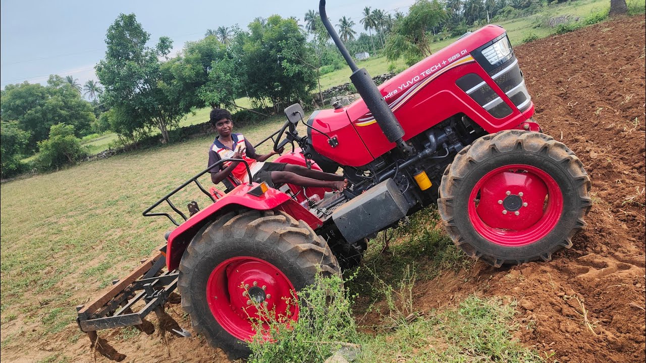 Mahindra yuvo tech plus 585 4wd tractor goes to 9 point cultivator performance in soil farmland