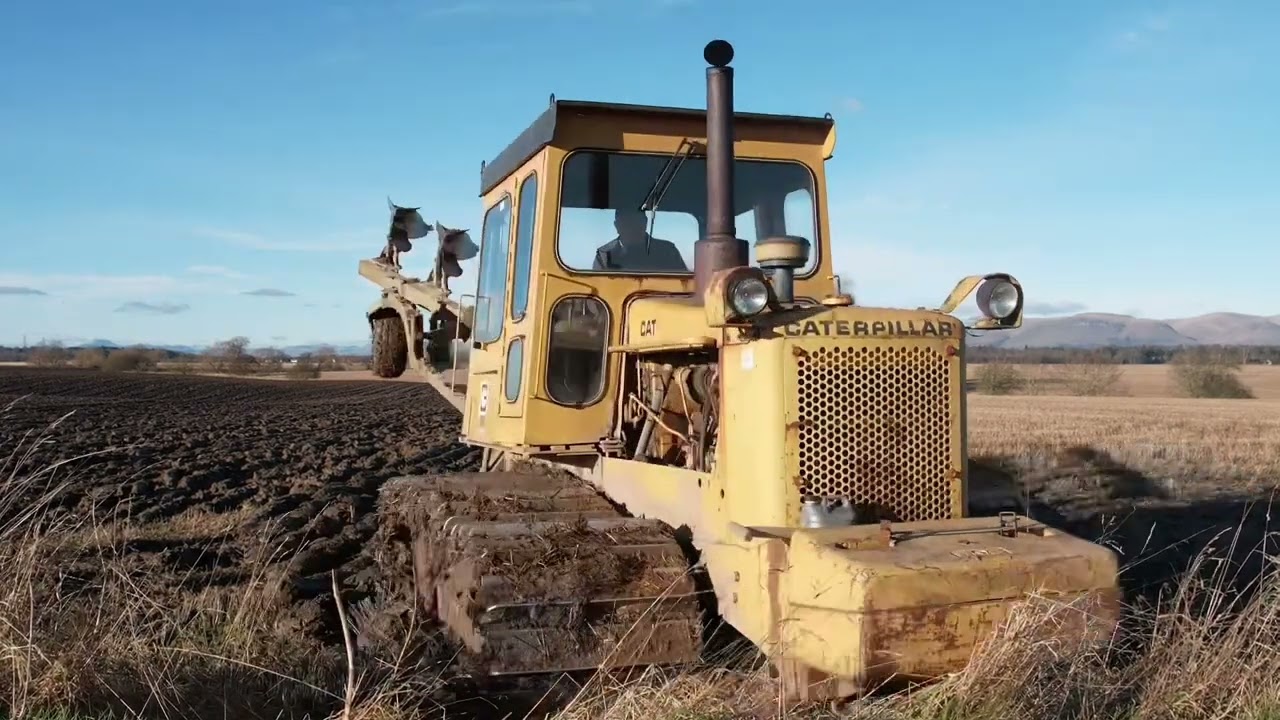 A rare sight! Cat D5B ploughing with a six furrow dowdeswell
