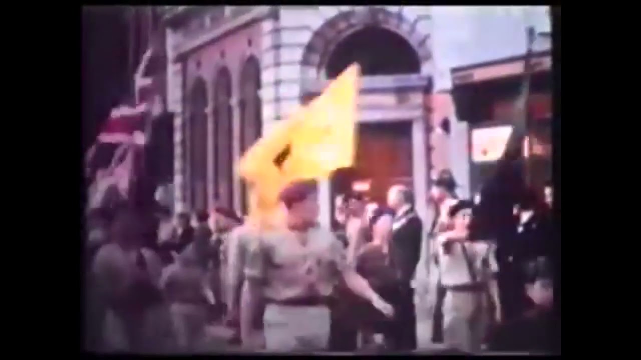 Scouts & Guides on St George's Day Parading through Ormskirk, 1961