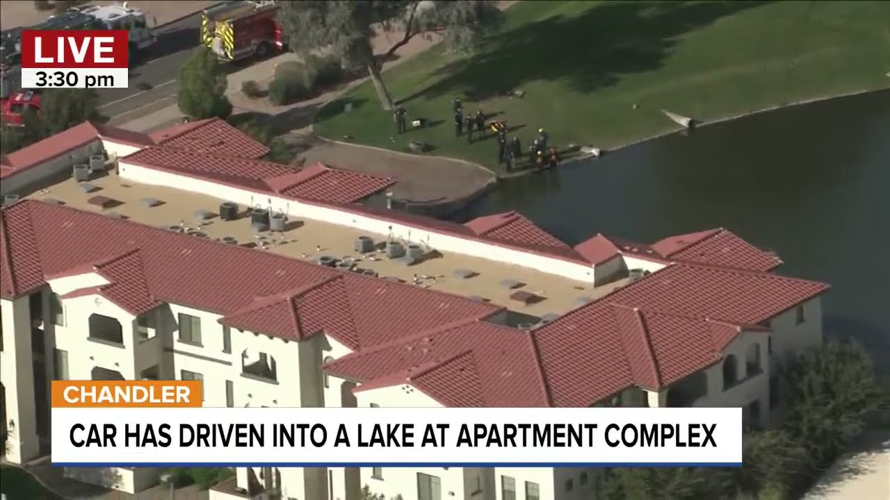 LIVE AERIALS: A car has driven into a lake in Chandler