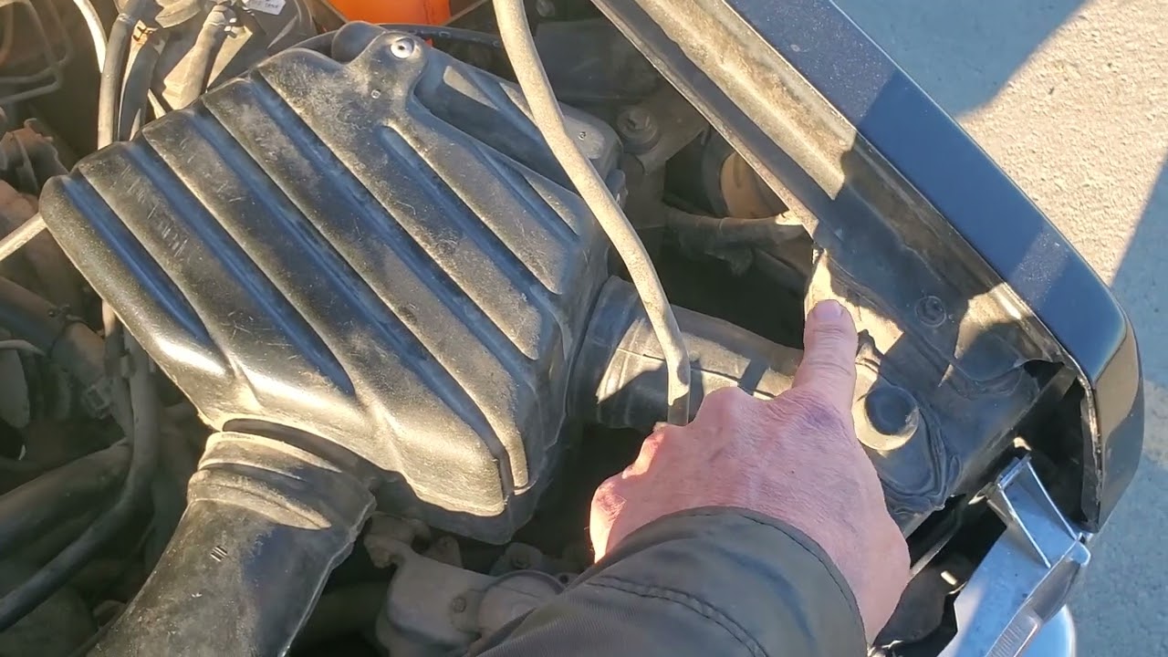 nissan D21 warm air intake for better winter mpg.