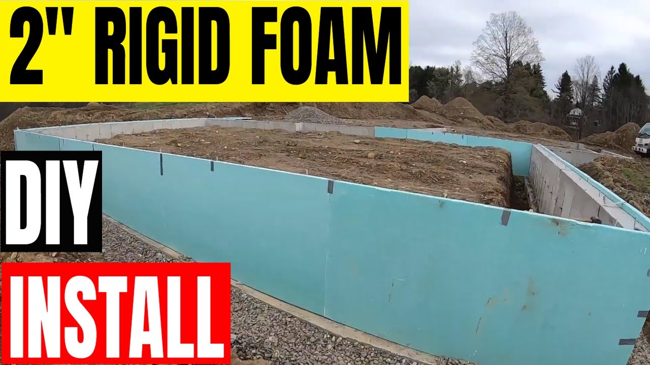 Installing rigid foam on concrete walls & back filling Tri-County  Excavating 'Dirt Boss'