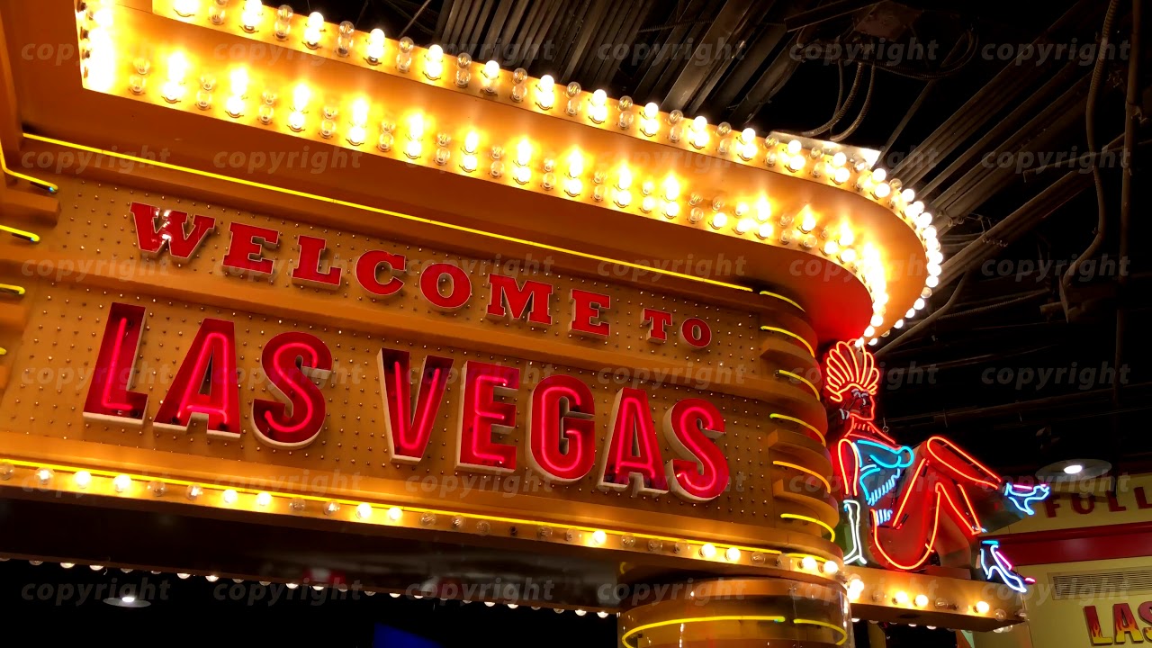 Welcome neon sign at casino entrance