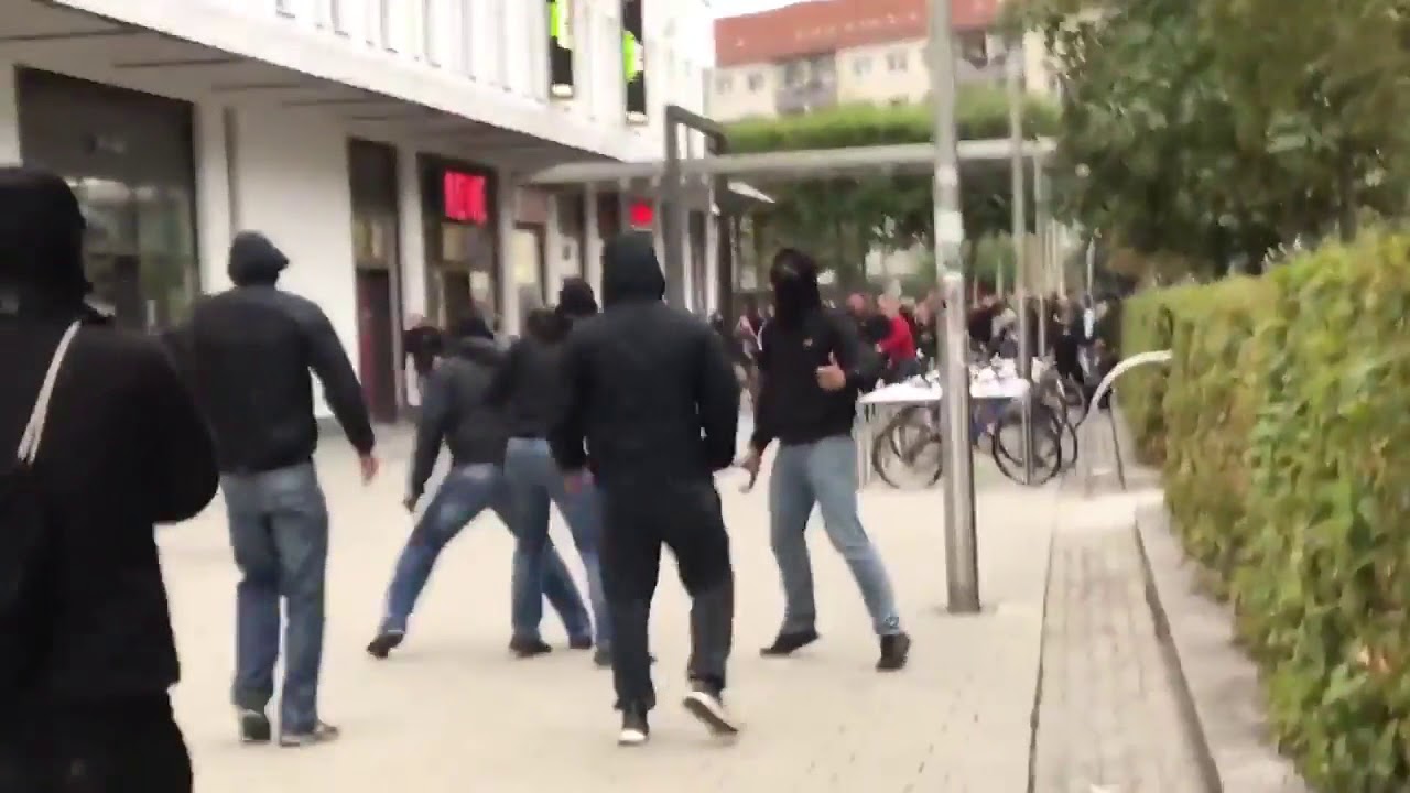 Antifa vs hooligans clash in Germany at Chemnitz anti-immigration protest 2018