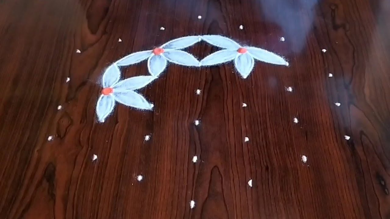 Simple deepam kolam only (7*4) dot's