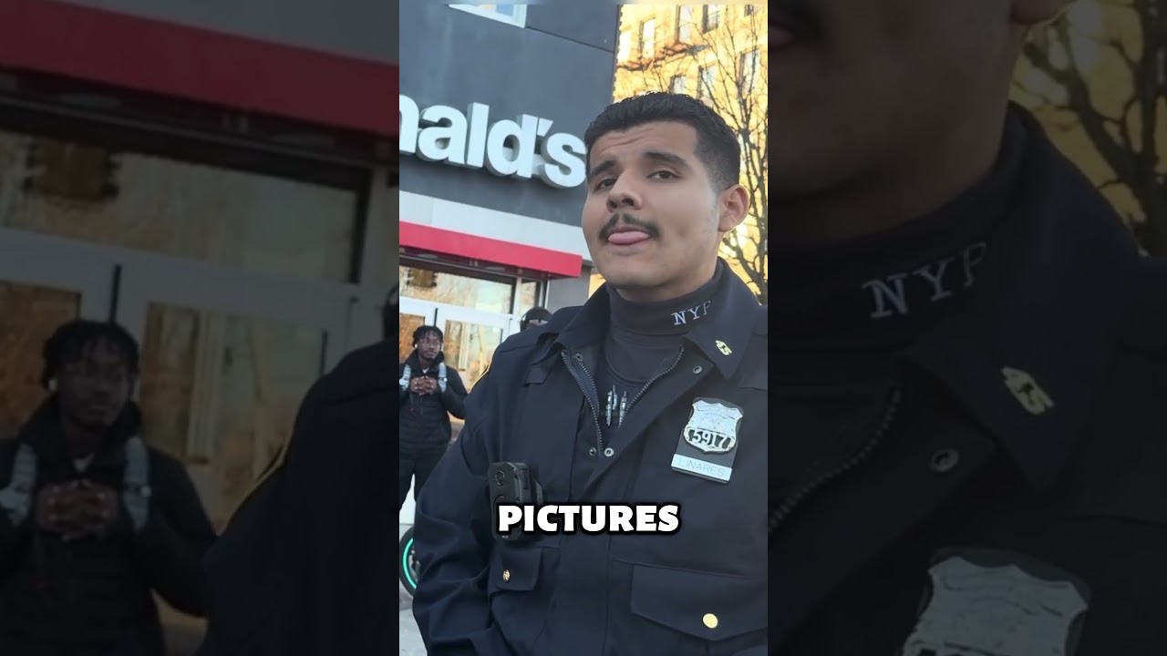 Man Confronts Police After Being Pushed While Filming