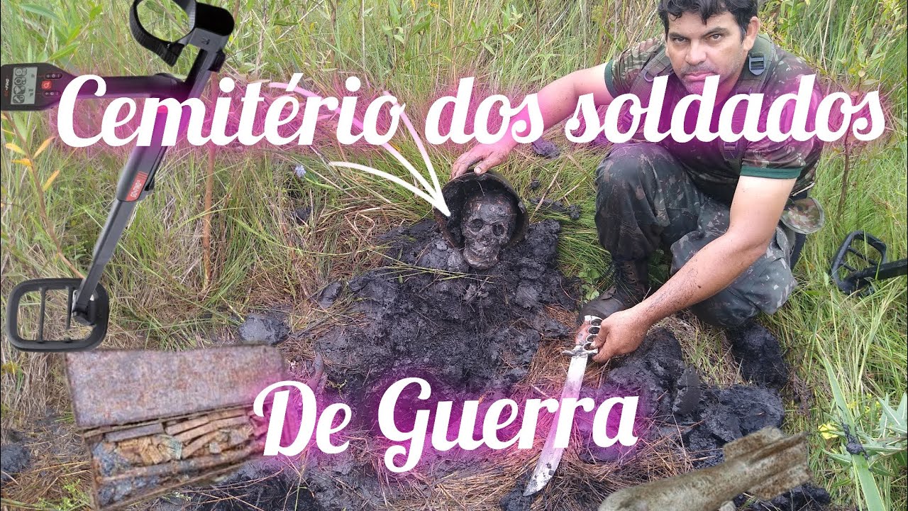 Detector de metal / detectorismo numa antiga trincheira de guerra , cemitério dos soldados