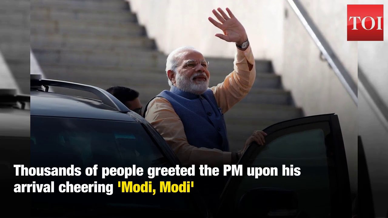PM Modi does a 'roadshow' after casting his vote for Gujarat Elections 2017
