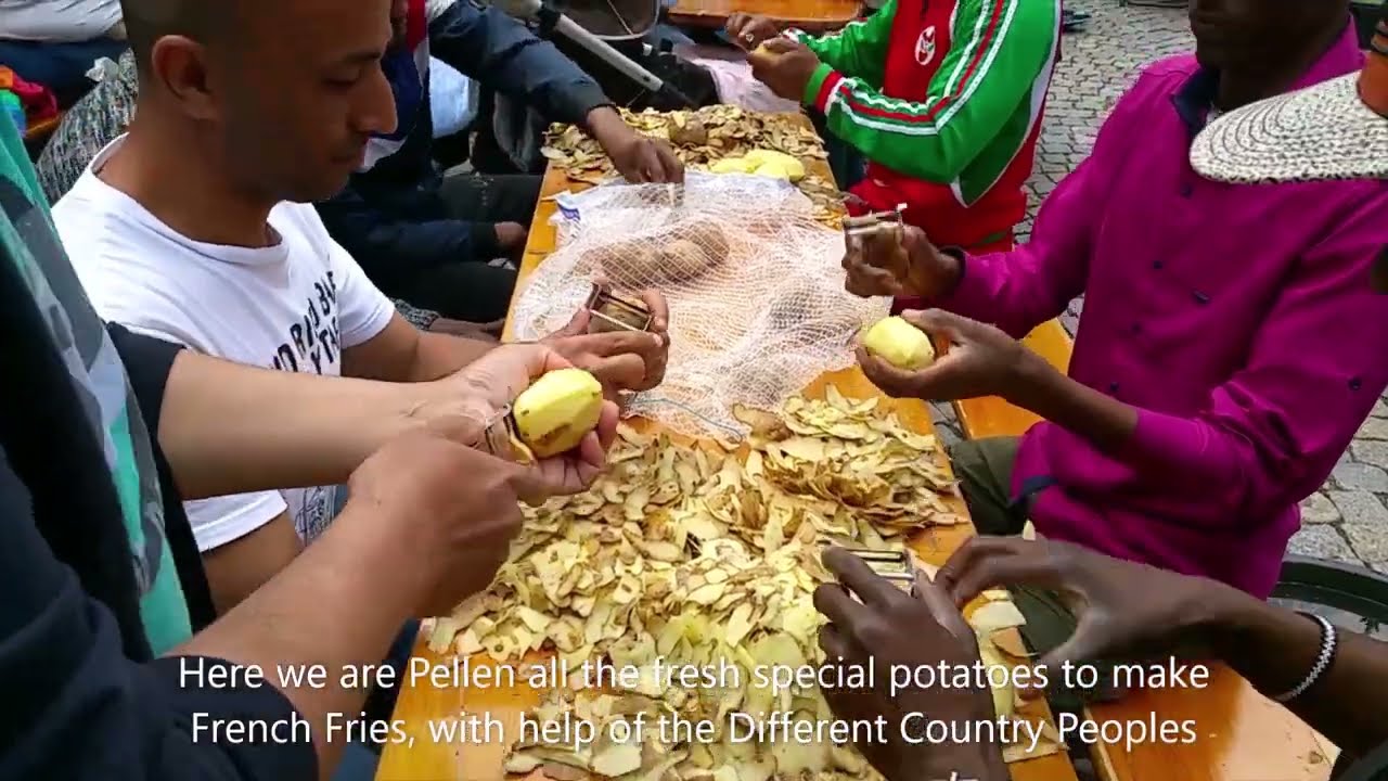 Worlds 90 countries People Making Belgium fries, In Mechelen to make a World Record