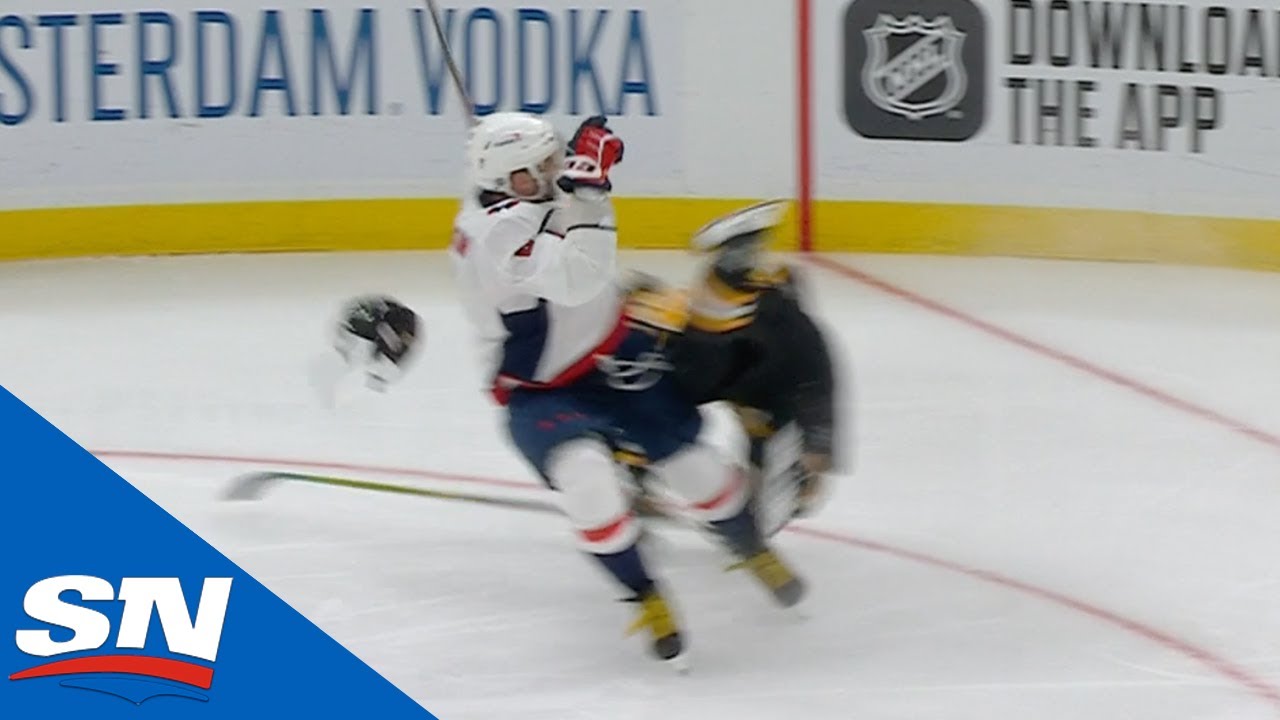 Alexander Ovechkin Sends Brad Marchand Flying With Massive Crunch