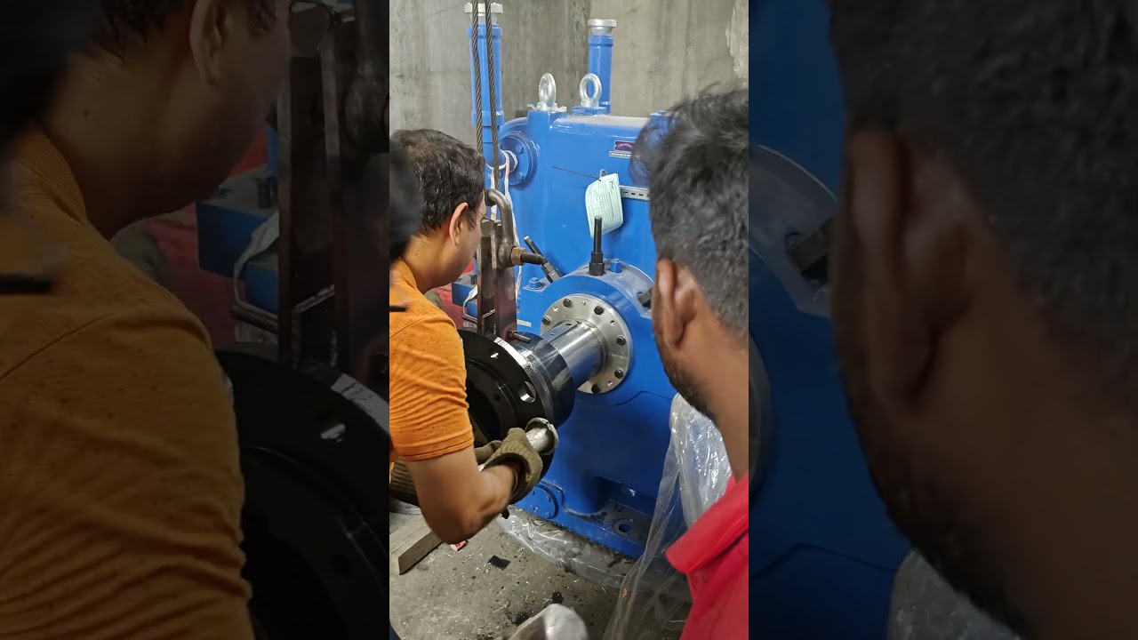 Shrink fited of coupling into the hub of a generator rotor by heating the hub.