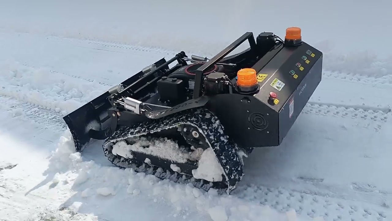 remote operated grass trimming machine with snow plow snow blade snow shovel snow removal machine