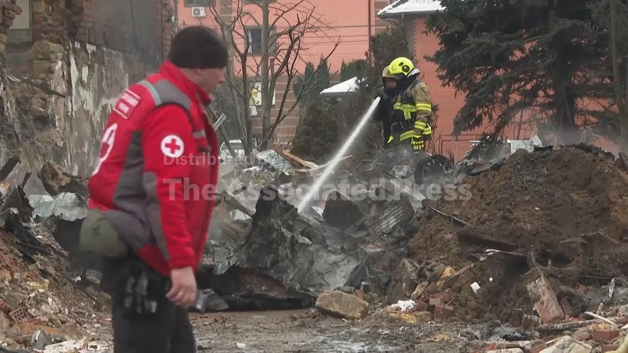 Russian missile and drone barrage hits Kyiv suburbs, killing 1 person