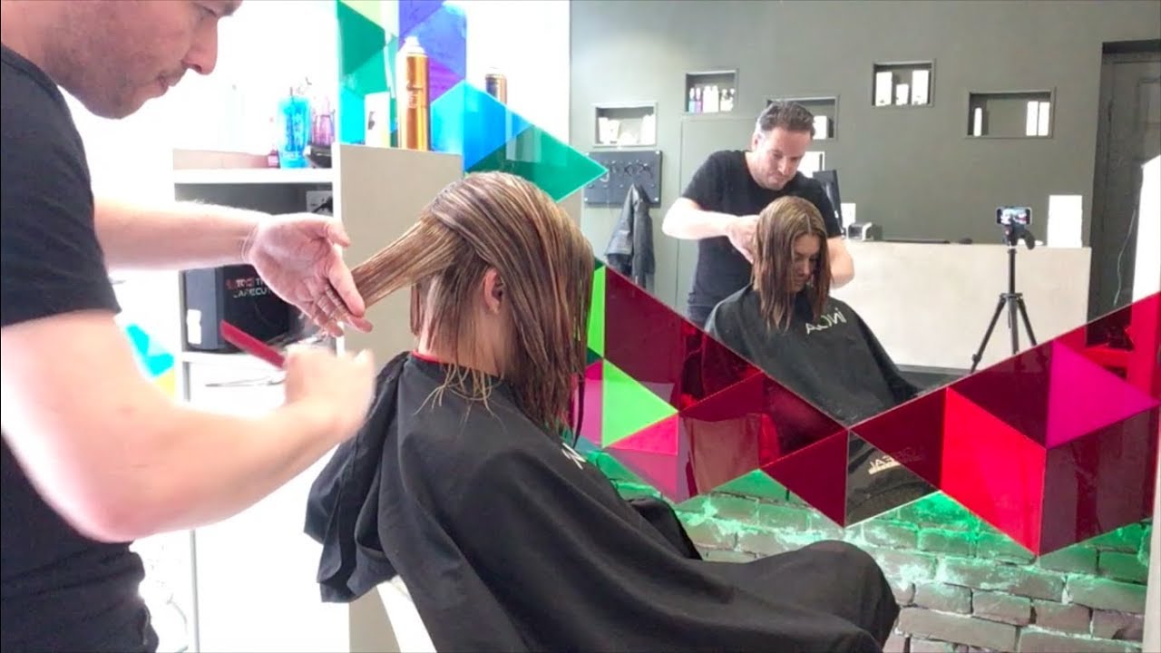 A graduated bob haircut with undercut
