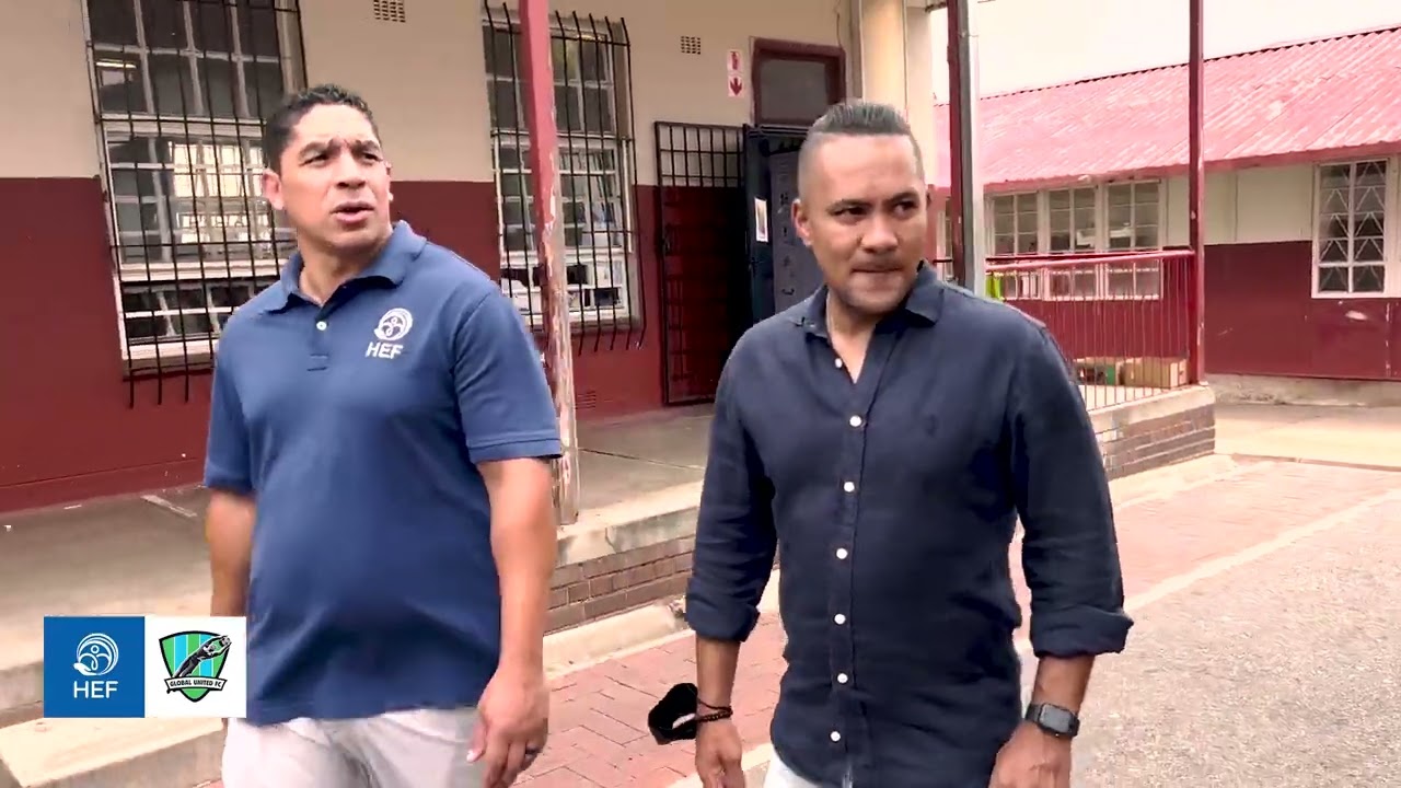 Soccer legend Stanton Fredericks visits Newclare where he was schooled with stationery 4 needy kids