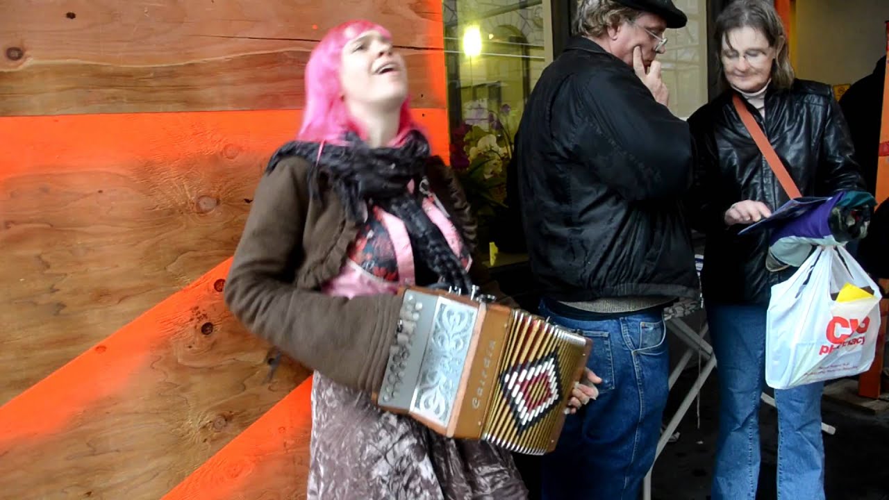 Renée de la Prade playing Concrete Jungle by Bob Marley on Accordion