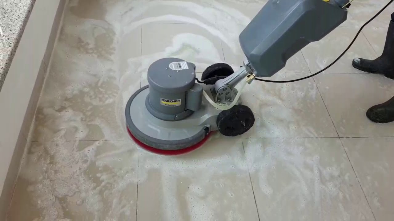 One by one tiles cleaning with Karcher single disk
