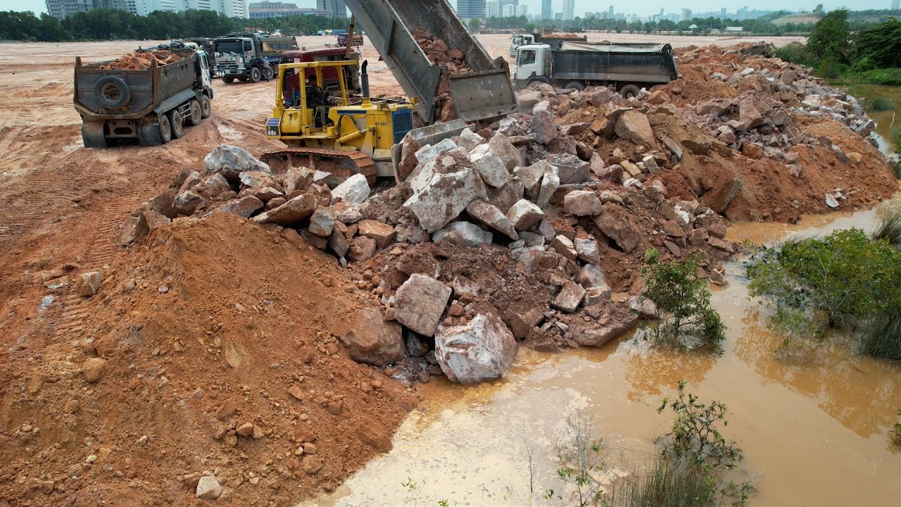 The Greatest Land Filling Activities Big Dozer Pushing Rocks, Heavy Dump Truck Unloading Rock