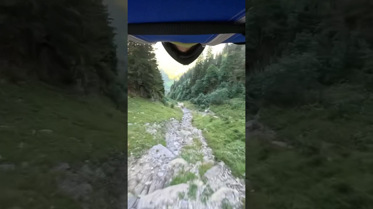 Insane proximity wingsuit flight in Swiss alps #wingsuit #basejump #gopro
