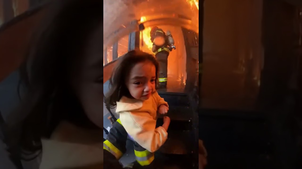 FIREFIGHTER SAVES A DOG AND A GIRL 