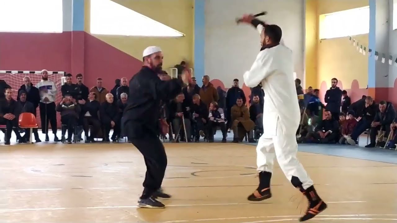 رياضة العصى التقليدية مع الشيخ إسماعيل شرفاوي ڨندوز الشيخ بوعمامة Algérien Traditionnel Combat Stick