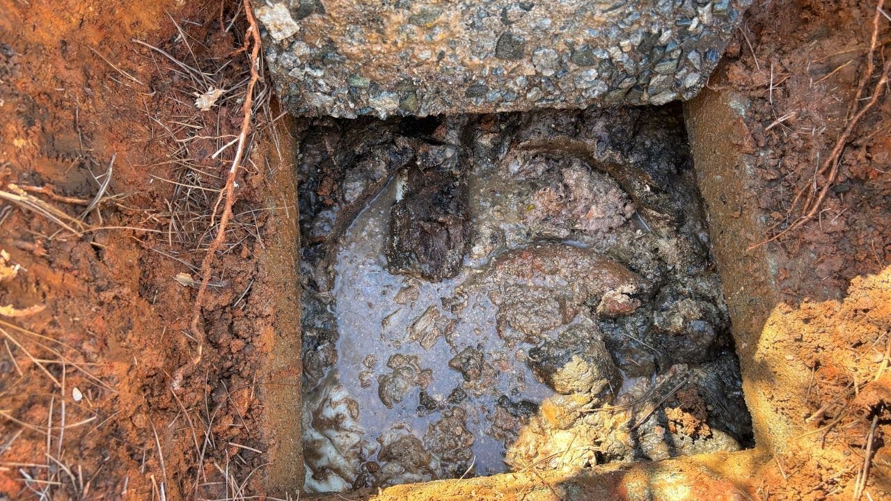 Pumping a very full septic tank and clearing a clog