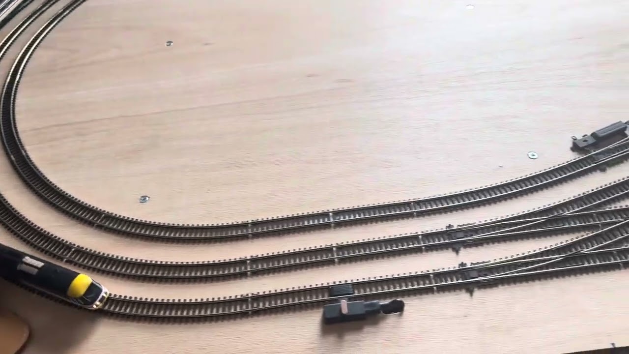 TT:120 mostly glued down layout with motorised points checking out functionally for changing lines.