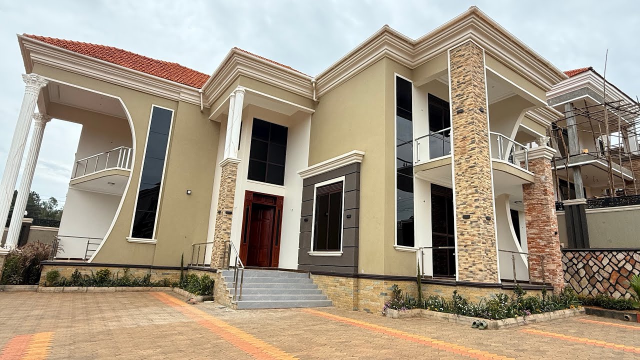 Touring a family house in Uganda $390,000 USD 