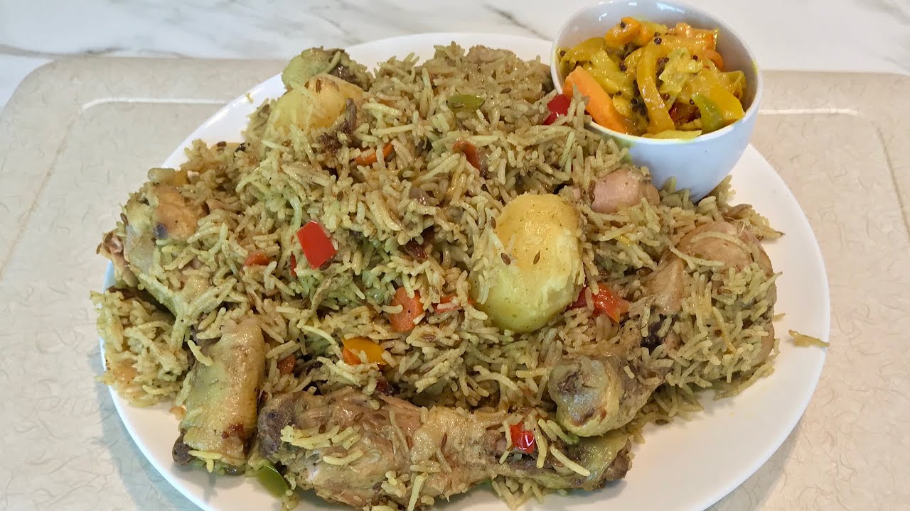 Pilau ya kuku yakuchambuka | Jinsi yakupika pilau ya kuku ya kiswahili kwa njia rahisi sana | Pilau.
