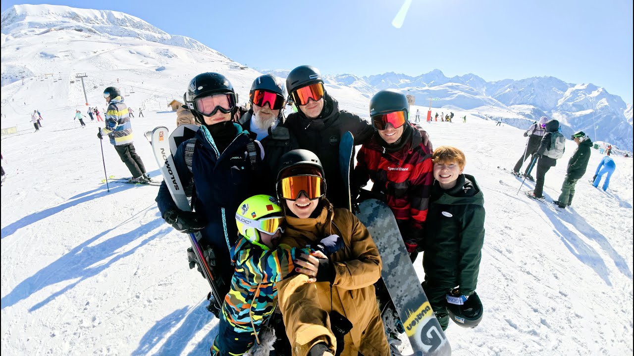 Family skiing and snowboarding in Alpe d'Huez, January 2026