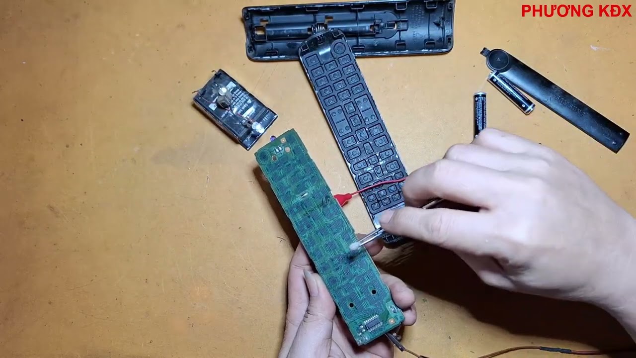 Sửa remote samsung chạm phím tự nhảy tín hiệu trên tivi và cách kiểm tra sửa đơn giản nhất