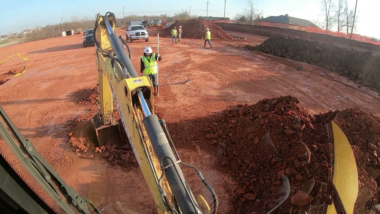 Backhoe diggin a footing for a stem wall. #MBGA #Backhoe #diginok