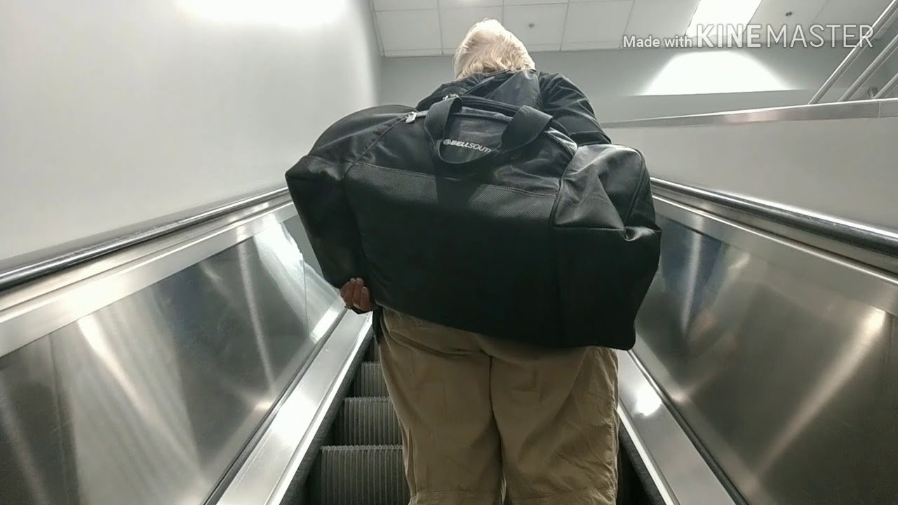 Escalators and moving sidewalk at airports in Barcelona and Atlanta 6-12-19